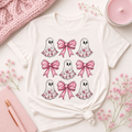 Pink ghost and bows Halloween t-shirt with floral ghost graphic on white tee