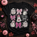 Coquette ghost and bows Halloween t-shirt with pink ghost characters on black tee
