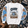 White Cozy Season sweatshirt with a coffee cup, snowflakes, and winter details