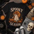 Spooky Season ghost t-shirt with vintage Halloween graphic on black tee