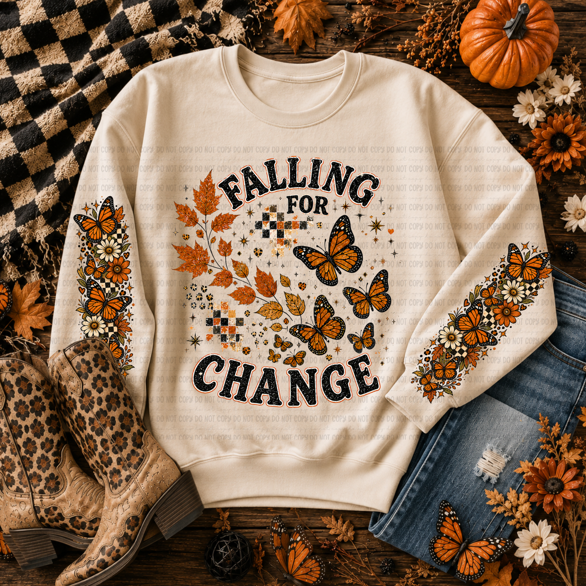 Cream Falling for Change sweatshirt with autumn leaves, orange butterflies, and seasonal details