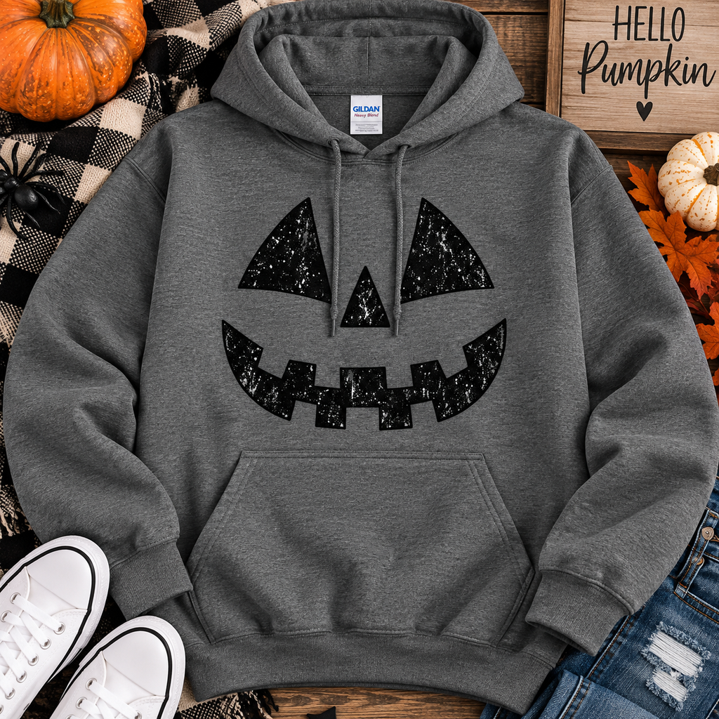 Dark grey hoodie with distressed jack-o'-lantern face design