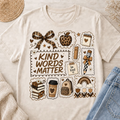 Kind Words Matter teacher t-shirt with leopard and school supply stamp collage on natural tee