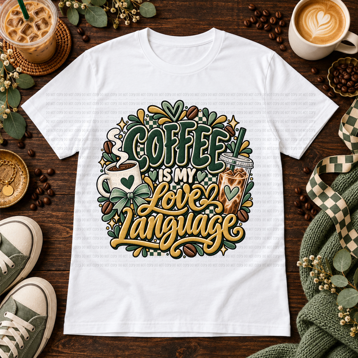 White graphic T-shirt with hot and iced coffee, bows, coffee beans, and the phrase Coffee Is My Love Language